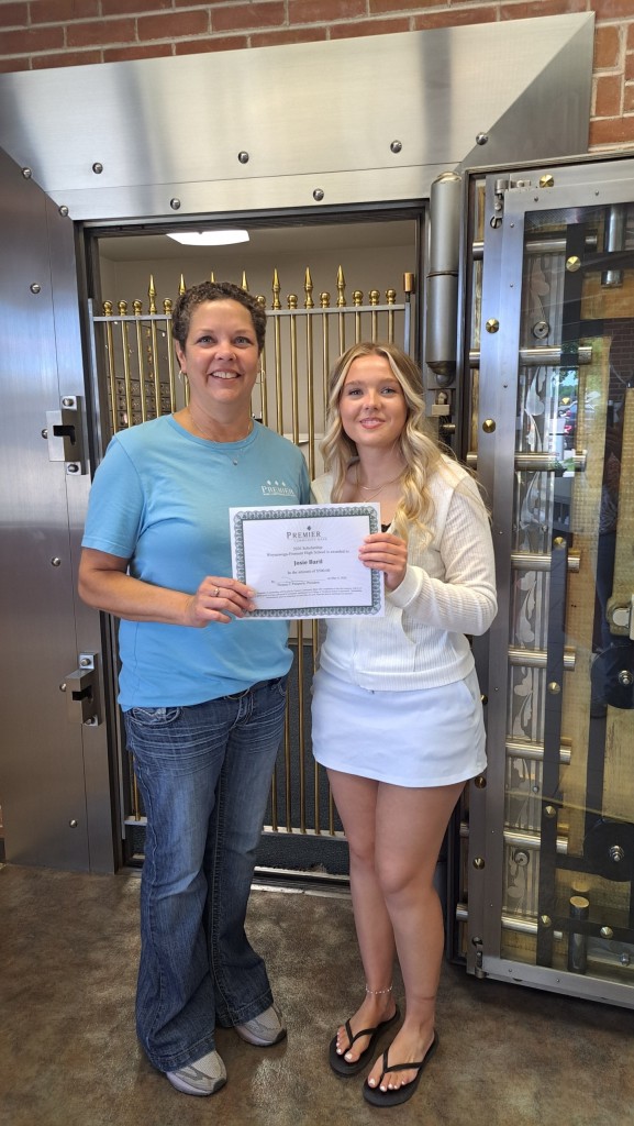 Josie Baril accepting Fremont Scholarship from Mandy Zastrow